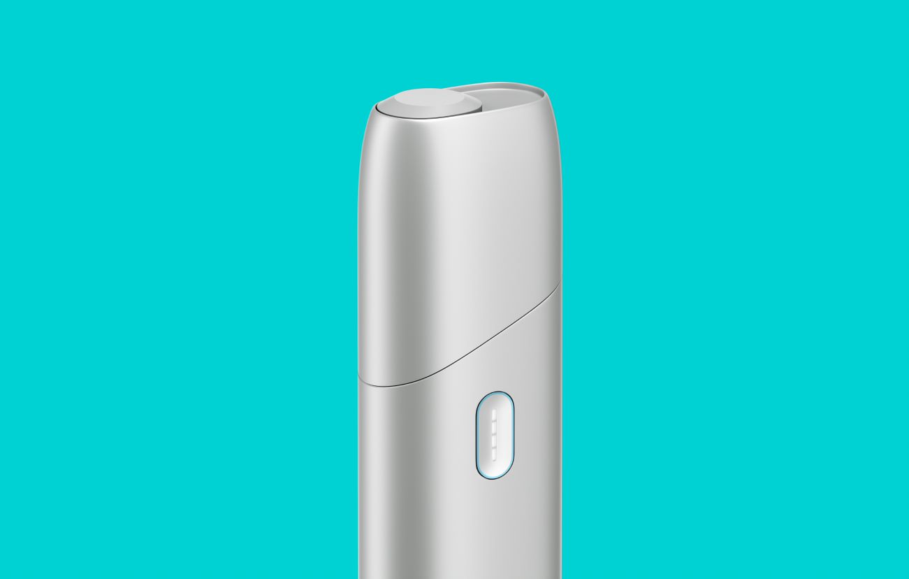 IQOS Originals ONE heated tobacco device in silver color.